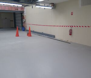 A Beep Test course track, with witches hats set up for fitness tests inside the Davis Utilities Building.