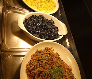 Spaghetti carbonara, squid ink fettuccine with feta and beetroot fettuccine with homemade pesto.