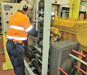 Richard checking the flux capacitor on an engine in the Powerhouse.