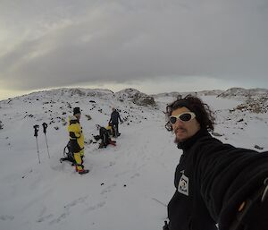 Lotter takes a selfie during the walk. Behind him are Tony and Daleen.