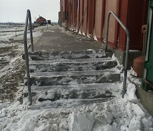 The external stairs at the workshop which are freshly cleared of snow.