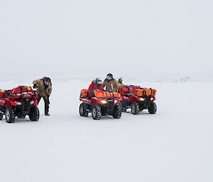 The bikes are out on the seaice. We've stopped so Marc can drill the seaice to measure thickness.