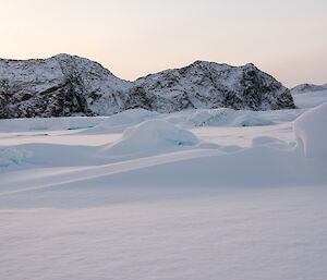 Rafted ice, sastrugi and snow drifts near way point PL-09. This snow prevented further travel.