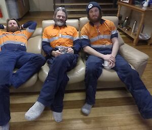 Our three electricians are sitting on the couch: Sharky, Barry B2 and Bryce. Collectively referred to as a “shock” of sparkies.