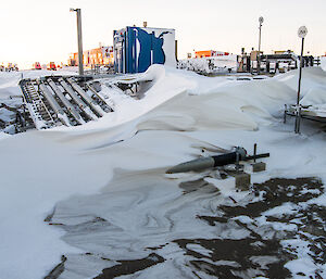 Snow engulfed Site Services pipework.