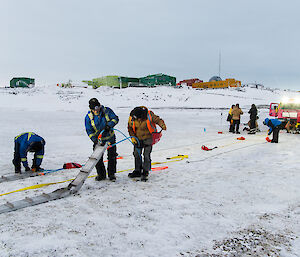Setting up the recovery equipment out on the sea ice.
