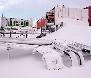 Deep snow deposited around the site services after the second blizzard.