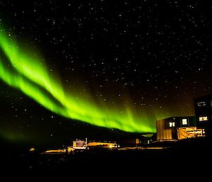 A bright green aurora lighting up the sky above Davis.