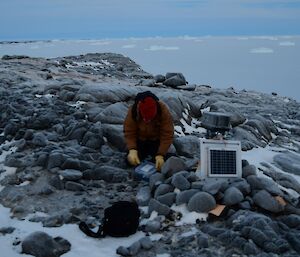Lötter in action, servicing the remote penguin camera.
