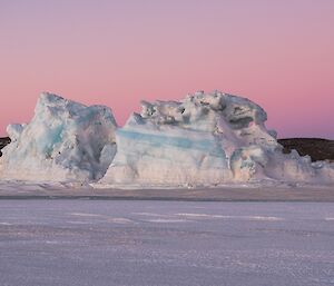 A grounded blue-striped iceberg on route to Watts hut.