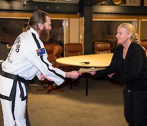 Kirsten receiving her yellow belt qualification.