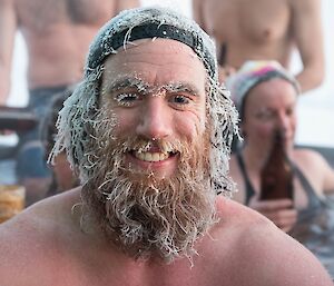 Shoey with an icy beard in the hot tub.