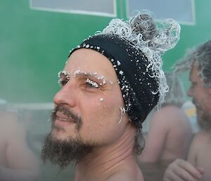 Lötter with icy eye lashes in the hot tub.