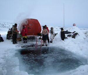 Tony standing on the edge of the ice about to take the plunge.