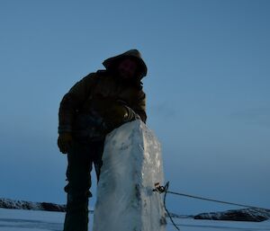 Jock with the extracted piece of ice.