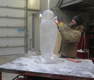 Jock working on the penguin sculpture.
