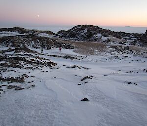 Kazak Island and the moon. The tower for the Automatic Weather Station can be seen out on the point.