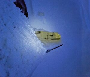 Happiness is finding the RMU door inside the wall of snow.