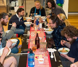 Sitting on the floor, eating our delicious Japanese dinner.