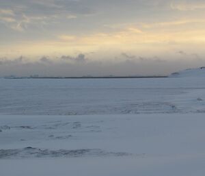 Open water is seen on the horizon off station.