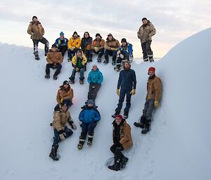 Group photo out on the snow dune in front of the living quarter.