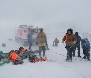The snow and wind picked up during the training adding to a more realistic scenario.