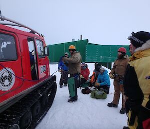 Jock showing the team how to attach to the Hägg in crevassed terrain.