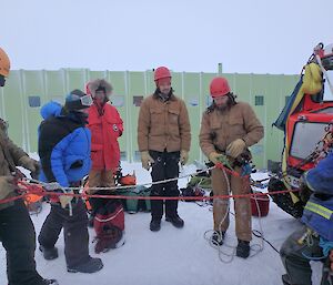 Sharky demonstrating how to attach various ropes to the belay and main lines running out from the Hägg.