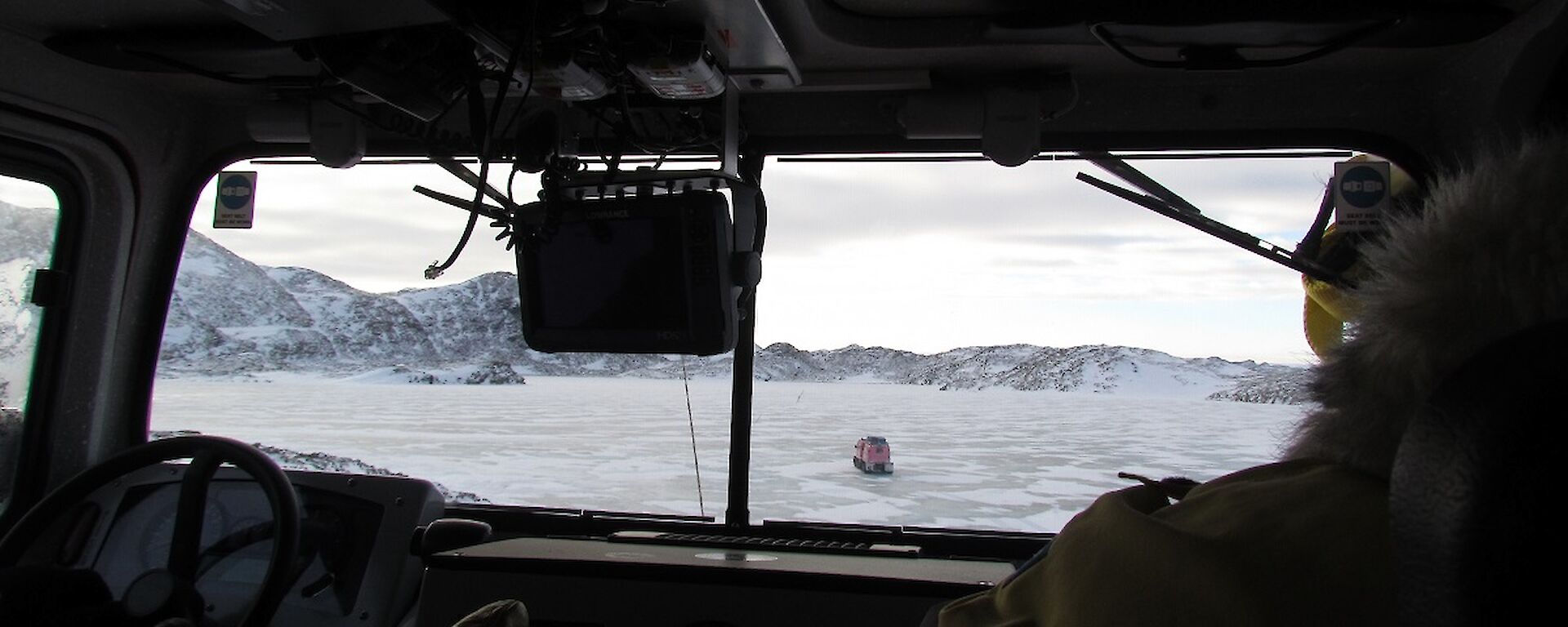 View from the back seat of a Hägg. On route to the campsite; crossing from Ellis Fjord onto Lake Druzhby.