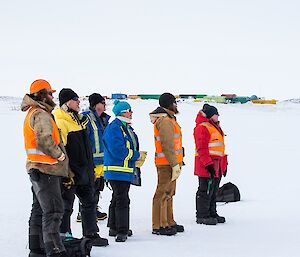 The drop zone team (Jock, Richard, Barry B2, Kerryn, Sharky and Kirsten) look for the plane as it approaches Davis Station.