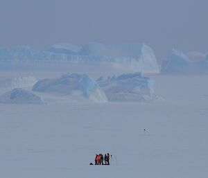 The view from station looking out at the team waiting on the ice near the Drop Zone. They've just spotted the plane.