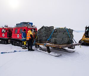 Two pallets loaded onto a sled using the skidsteer, to be towed back to station using the Hagg.