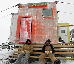 Shoey and Bryce having a cuppa on the bench outside Platcha hut.