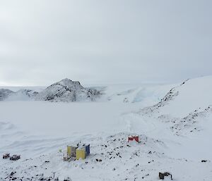 The view of Platcha Hut with Breid Basin in the background.