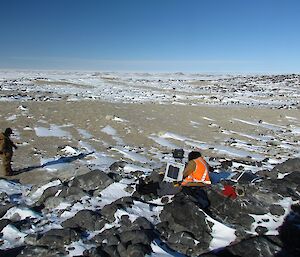 Barry B1 and Lötter at Gardner Island where Lötter is servicing the Adélie penguin monitoring cameras prior to the birds arrival.