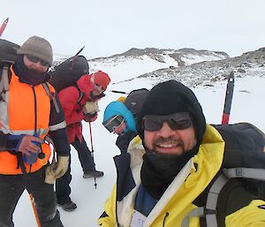 Jock, Lötter, Daleen and Tony are out walking with backpacks on.