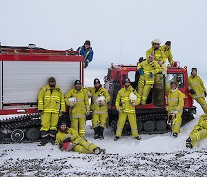 The Davis Winter Fire Team posing in front of the Fire Hägg.