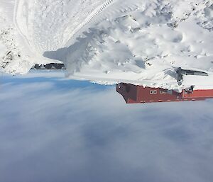 Still a lot of snow around station — the road from the LQ up to the summer accommodation buildings.