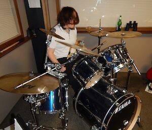 A man playing the drums.