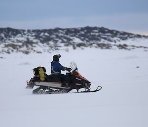 Richard testing the runway condition (smoothness) with a skidoo.