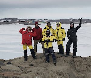 A group photo on an island.