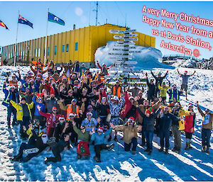 The station team in front of a building