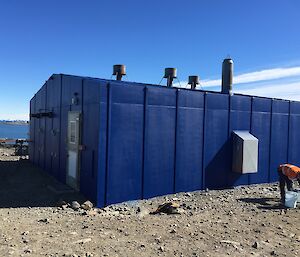 A blue painted powerhouse building