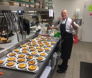 A chef prepares deserts