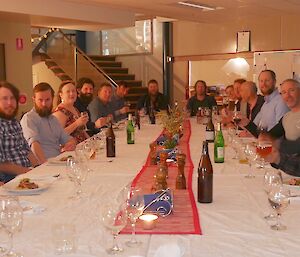 Looking down the nicely set table with 19 wintering expeditioners about to enjoy first course.
