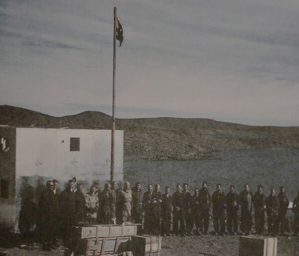 An early faded photograph of the men that established Davis station at the opening ceremony in 1957.