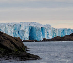 Photo of a small section of the Sorsdal glacier where it meets the ocean taken from the inflatable rubber boat