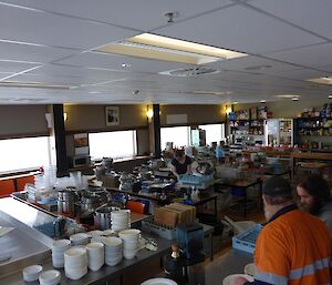 The Davis mess area, normally for expeditioners to sit and enjoy meals full of pots, pans, cooking utensils, dry food.