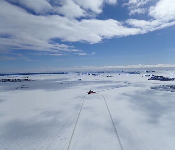 Aerial view of Aurora Australis in fast ice off Davis station