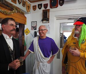 Expeditioners dressed as an aristocrat, Aristotle and an Aussie